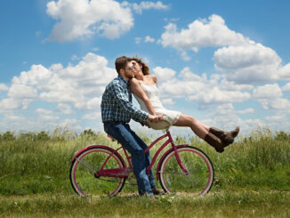 couple riding bicycle