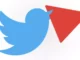 What do the red triangles mean on Twitter
