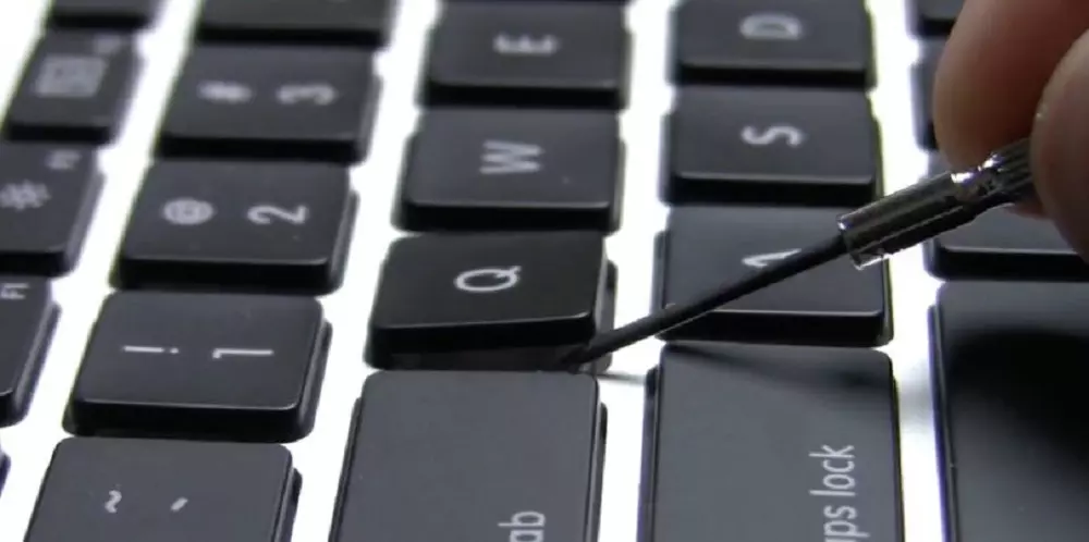 extraccion tecla macbook