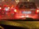 What lights should I turn on in my car when it's raining
