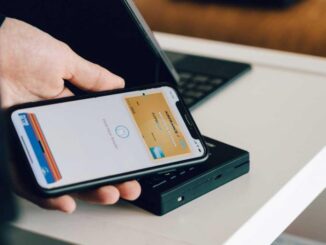 Is it safer to carry the bank card on your mobile or physically