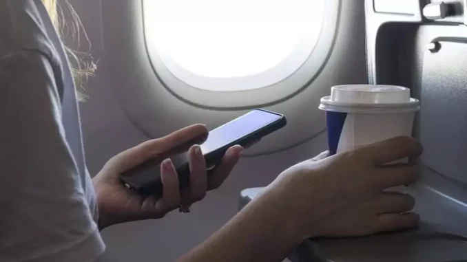 iphone på flyet